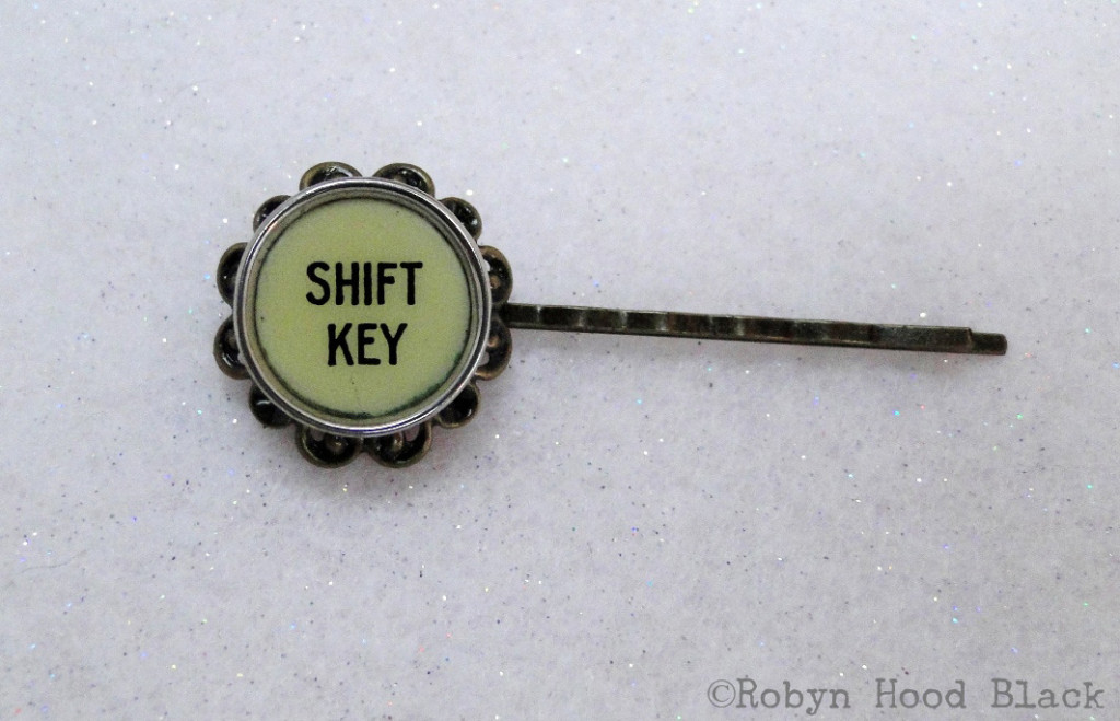 shift key filigree bobby pin with c