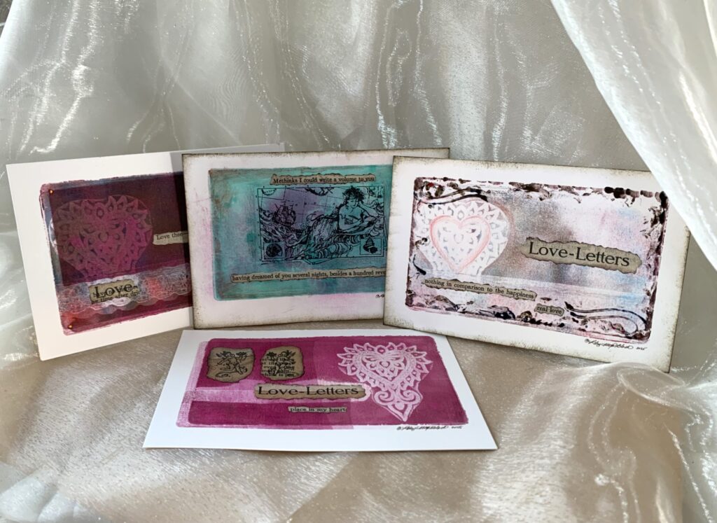 grouping of handmade valentine postcards featuring gel plate prints and stampings from vintage stamps, lace, and blocks, as well as copied text from an antique book.